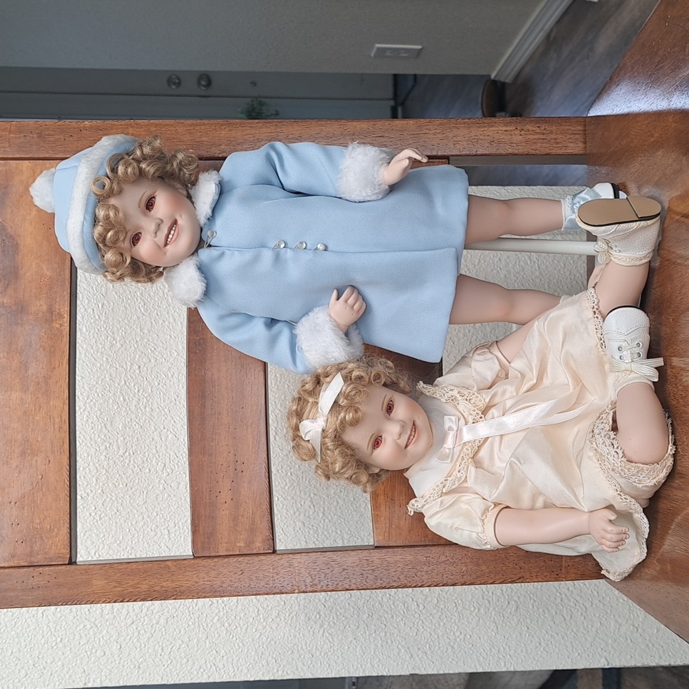 2 Shirley Temple porcelain Dolls